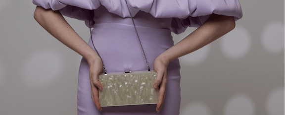 Wholesale - Acrylic Clear Ombre Gradient Glitter Bag with Chain Strap with a gradient glitter effect and stylish chain strap.