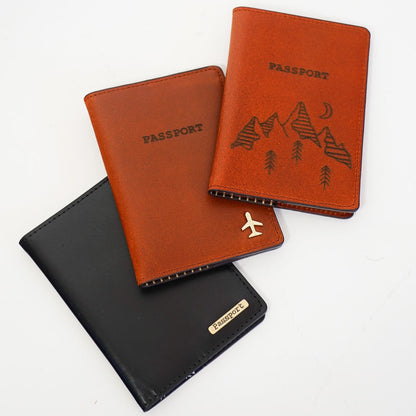 Three passport holders in black, brown, and orange on a white background