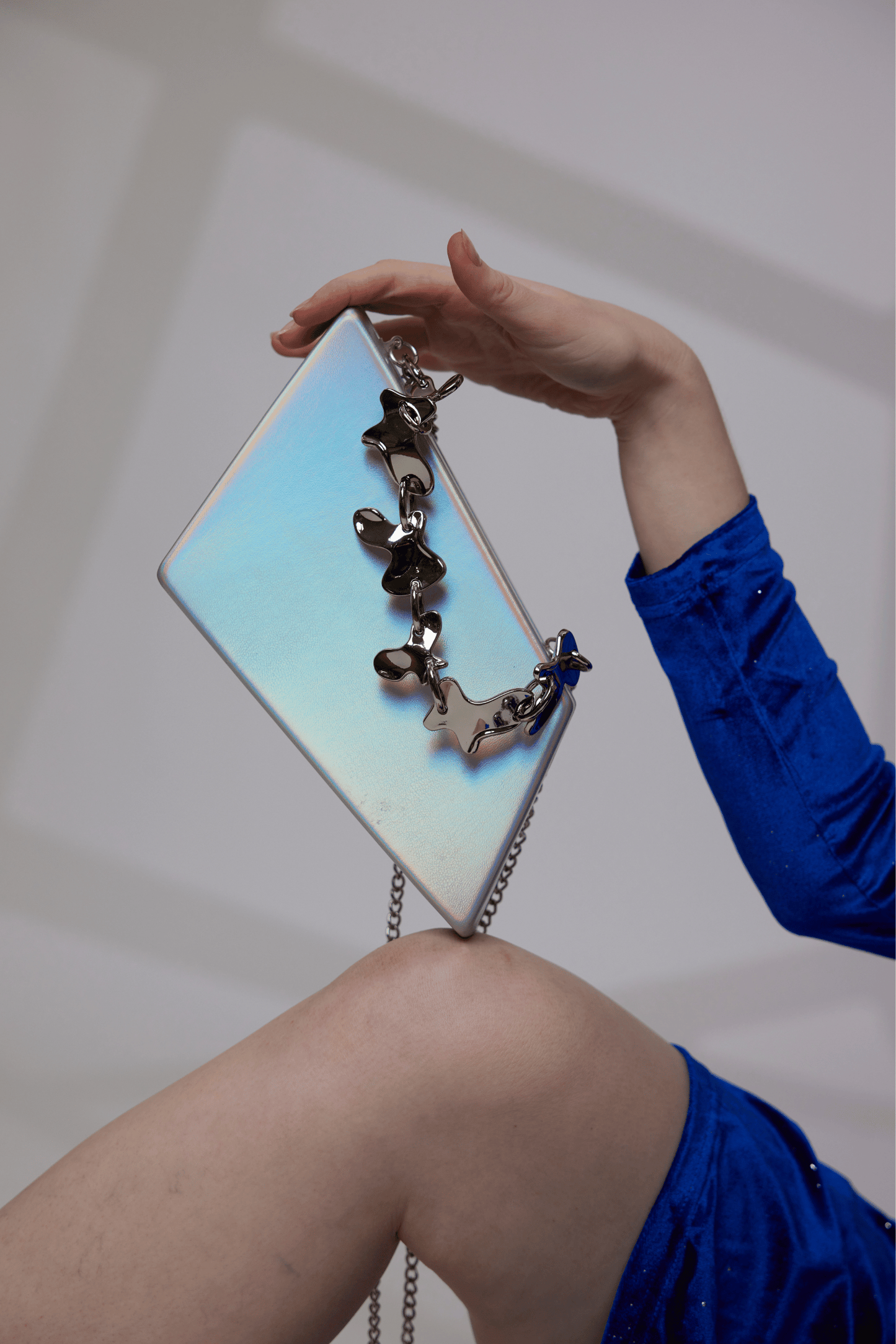 1600 - Dazzling Sophistication: Shimmer PU Asymmetrical Clutch - Wholesale Handbag - Most Wanted USA